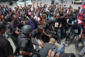 some-policemen-trying-to-stop-some-traders-from-the-arena