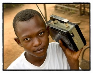 young-boy-listening-to-radio biafra